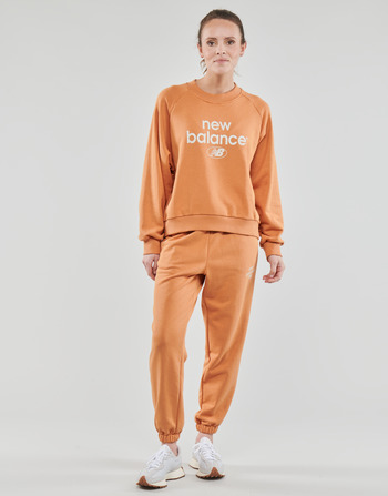 textil Dame Træningsbukser New Balance Essentials Reimagined Archive French Terry Pant Orange